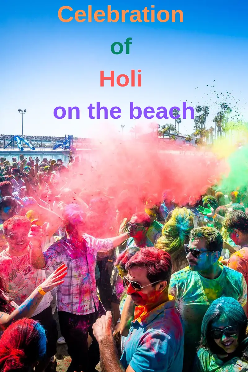 celebration of holi on the beach