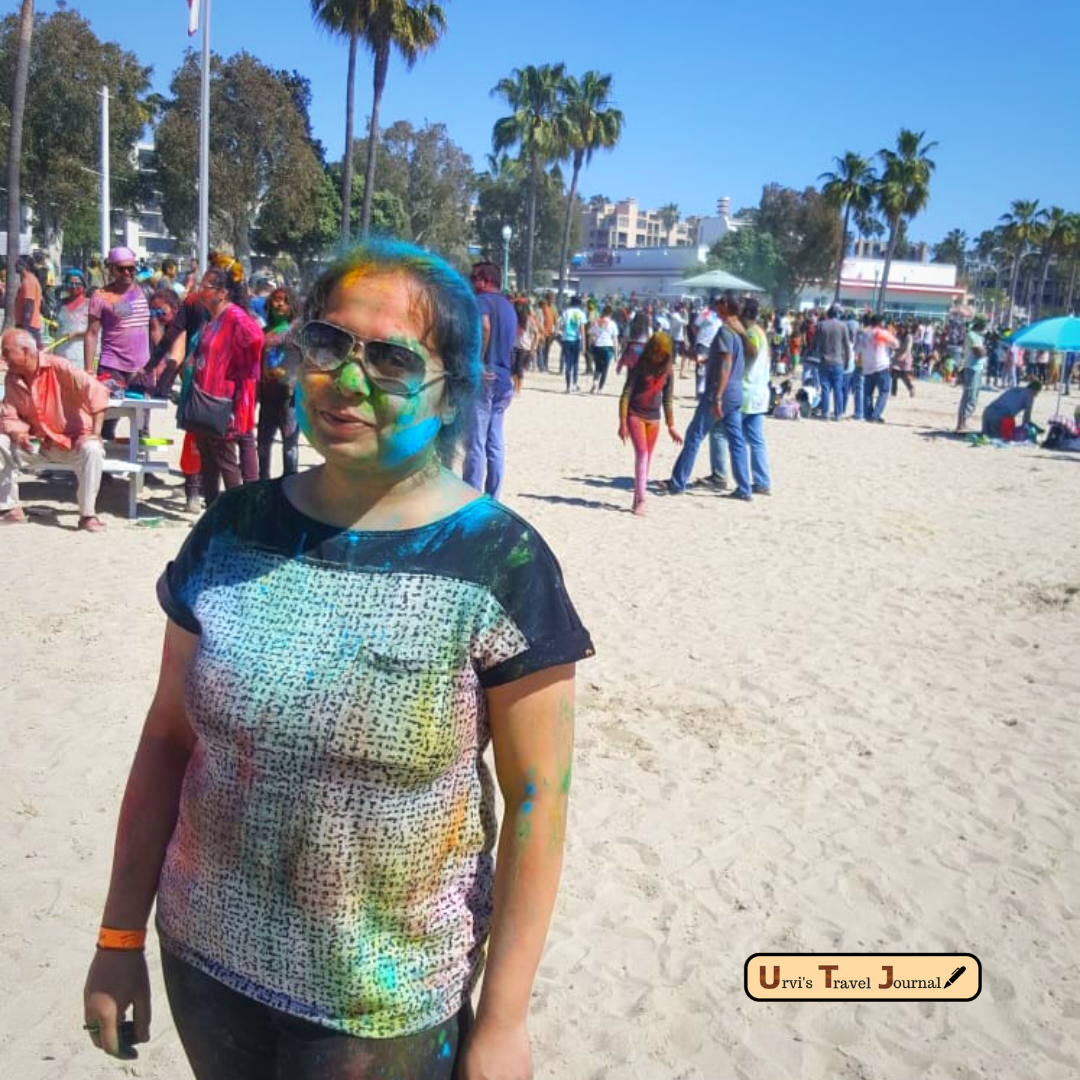 celebration of holi on the beach